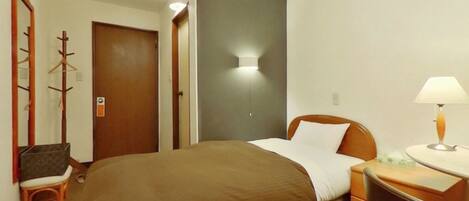 Premium bedding, desk, laptop workspace, blackout curtains