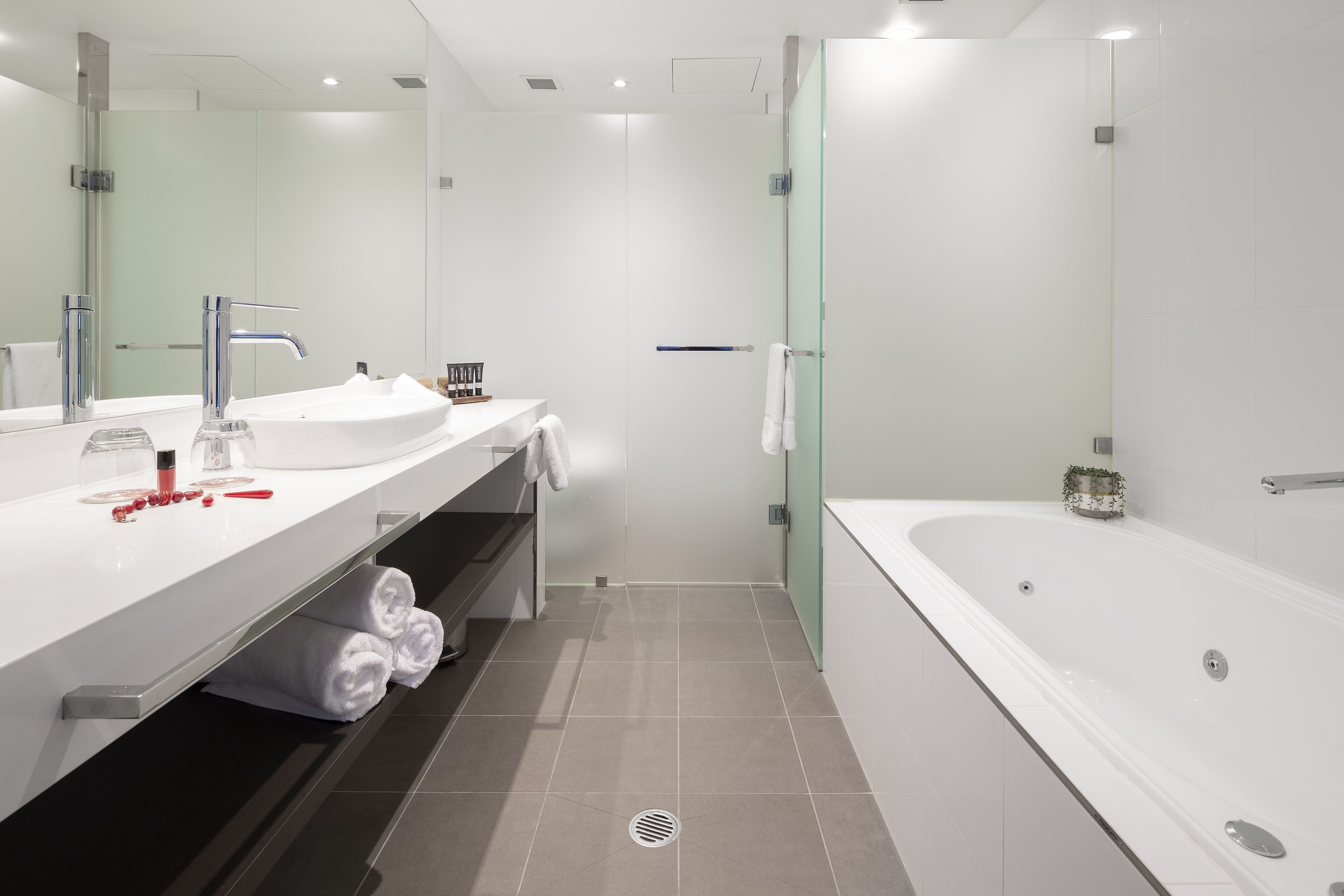 luxury studio | bathroom | shower, free toiletries, hair dryer, bathrobes