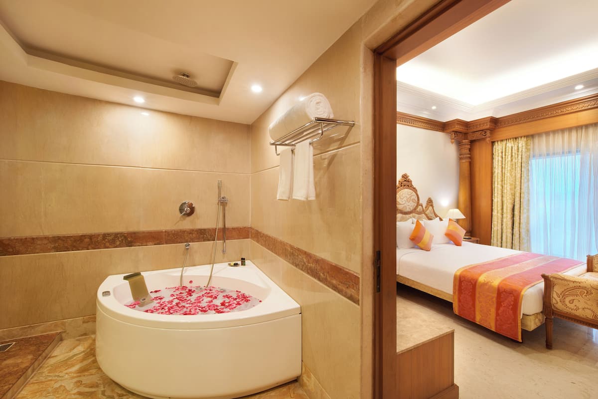tanjore suite | bathroom | hair dryer, bathrobes, slippers, towels