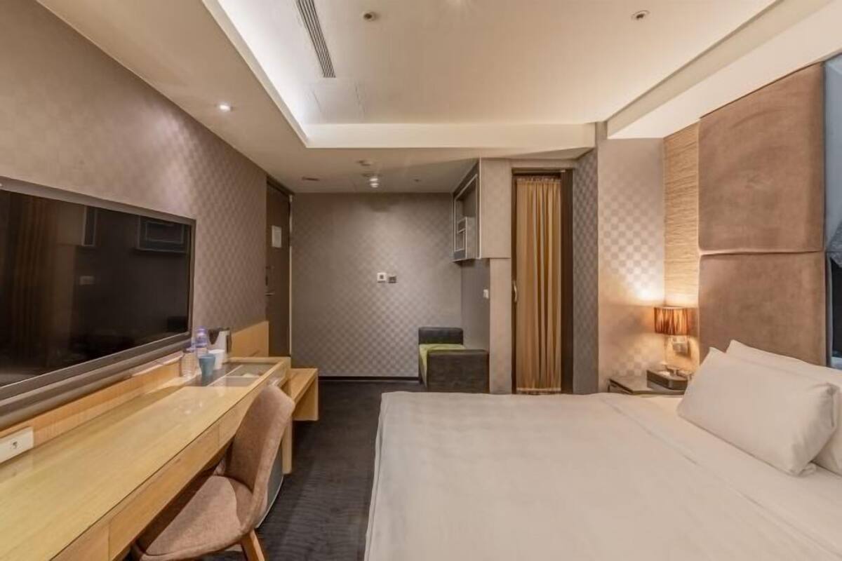 1 chambre, literie de qualité, couette en duvet