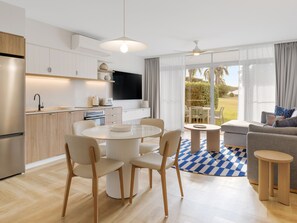 Apartment, 2 Bedrooms | Living area | Flat-screen TV, DVD player