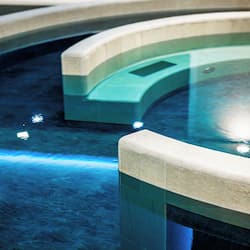 Indoor pool, seasonal outdoor pool, pool umbrellas, pool loungers