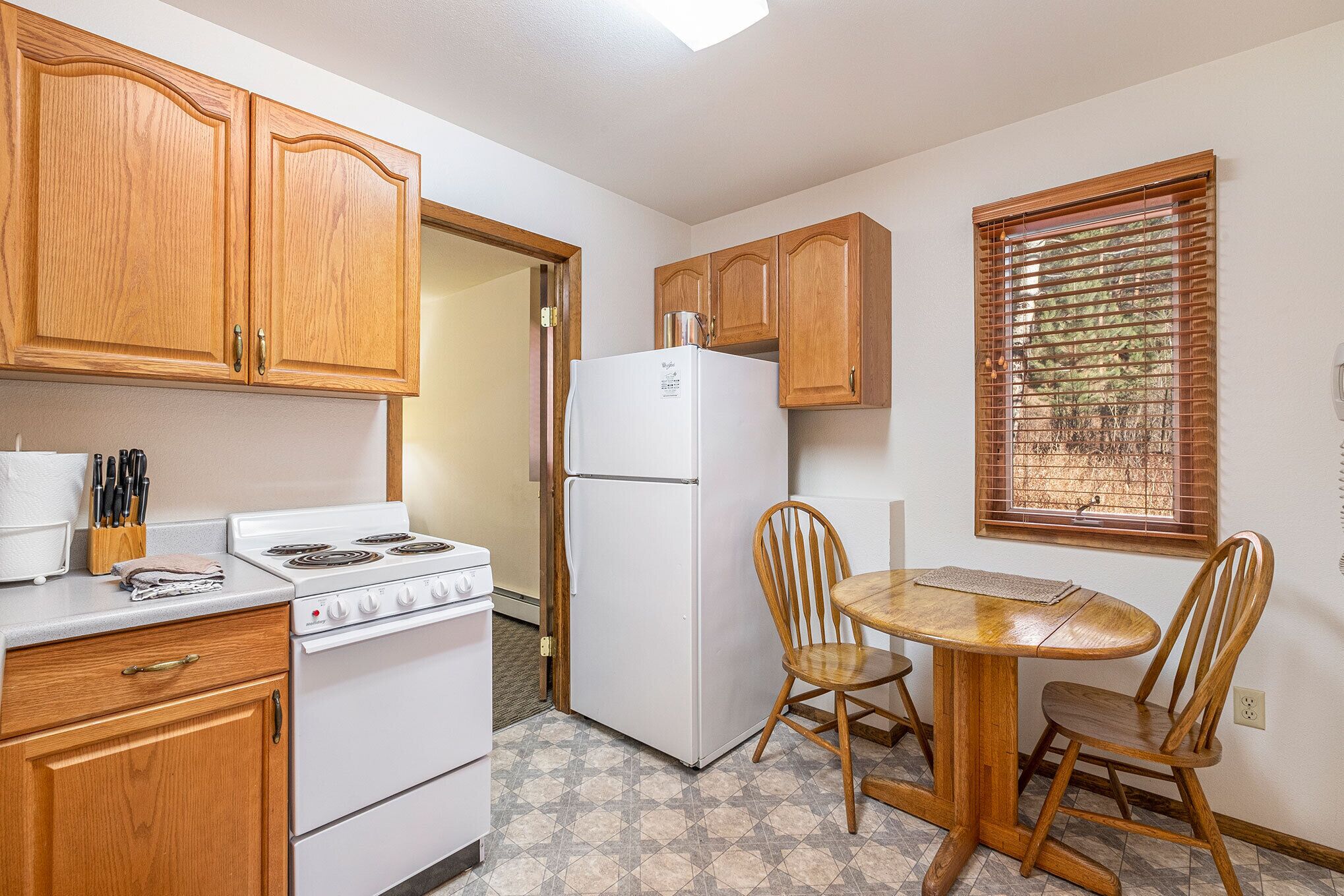 country, one bedroom suite (1 queen bed with sofa bed) | private kitchen | microwave, dishwasher, coffee/tea maker, cookware/dishes/utensils