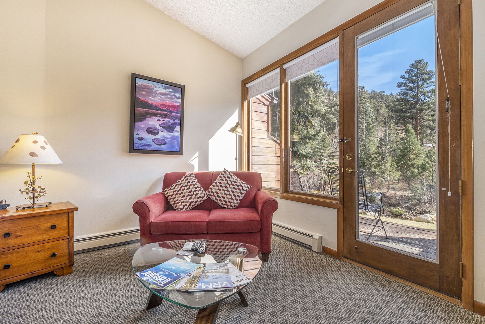 spa suite (1 king bed, no stove) | living area | 65-inch flat-screen tv with cable channels, tv, fireplace