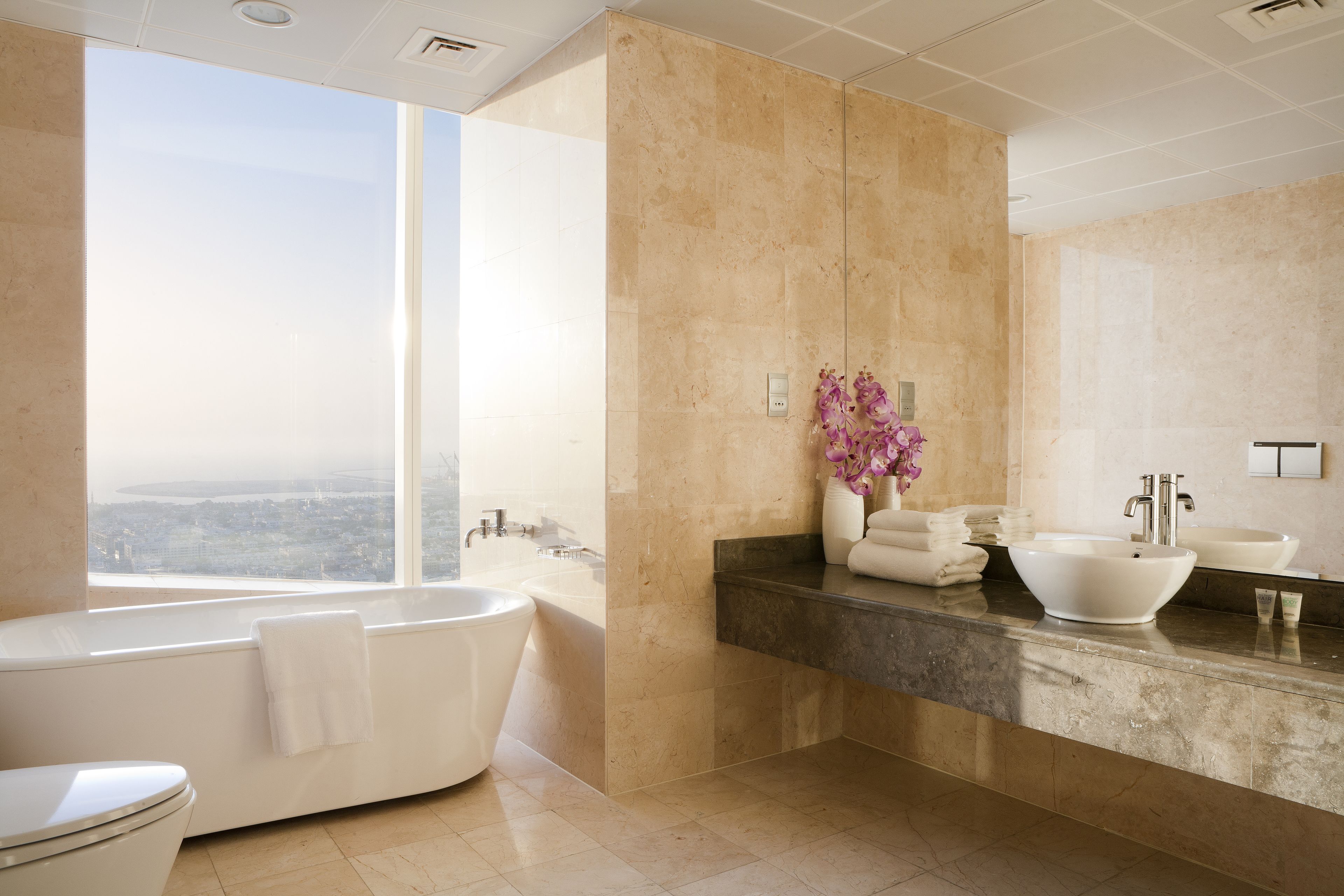 Deluxe Apartment, 2 Bedrooms | Bathroom | Separate bathtub and shower, deep-soaking bathtub, rainfall showerhead