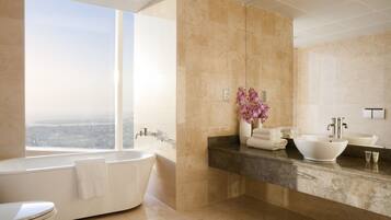 Deluxe Apartment, 2 Bedrooms | Bathroom | Separate bathtub and shower, deep-soaking bathtub, rainfall showerhead