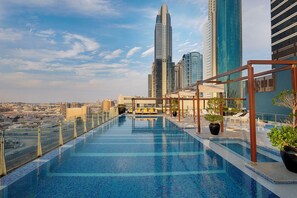Outdoor pool, pool umbrellas, pool loungers