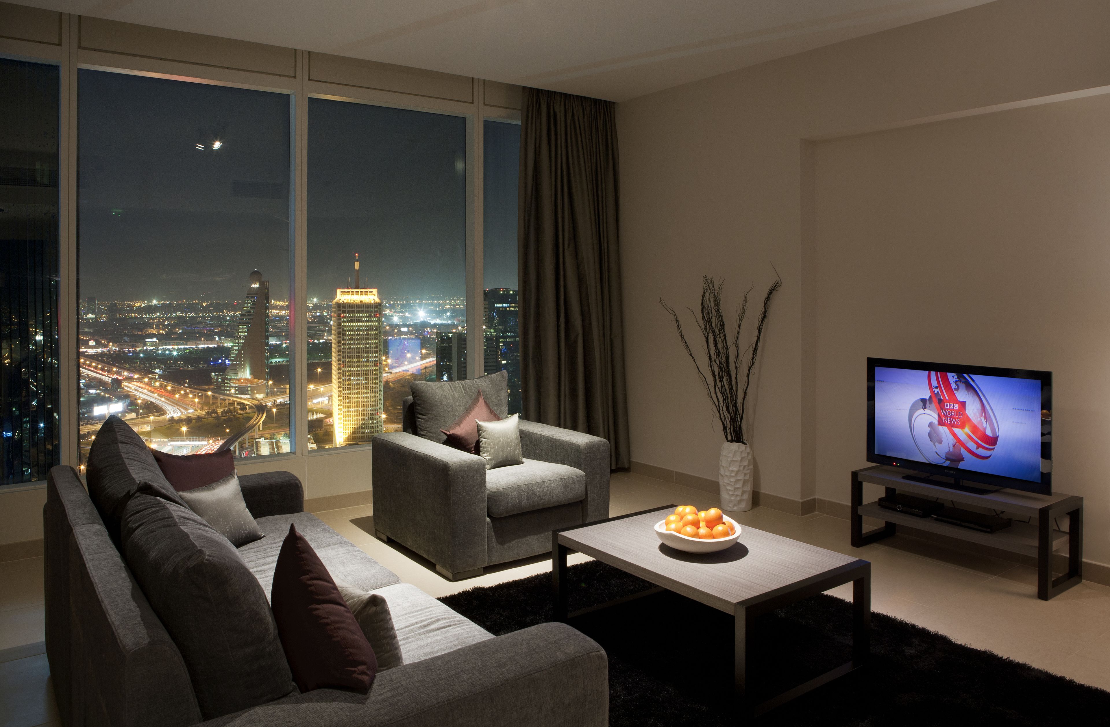 Deluxe Apartment, 2 Bedrooms | Living room | Flat-screen TV, DVD player
