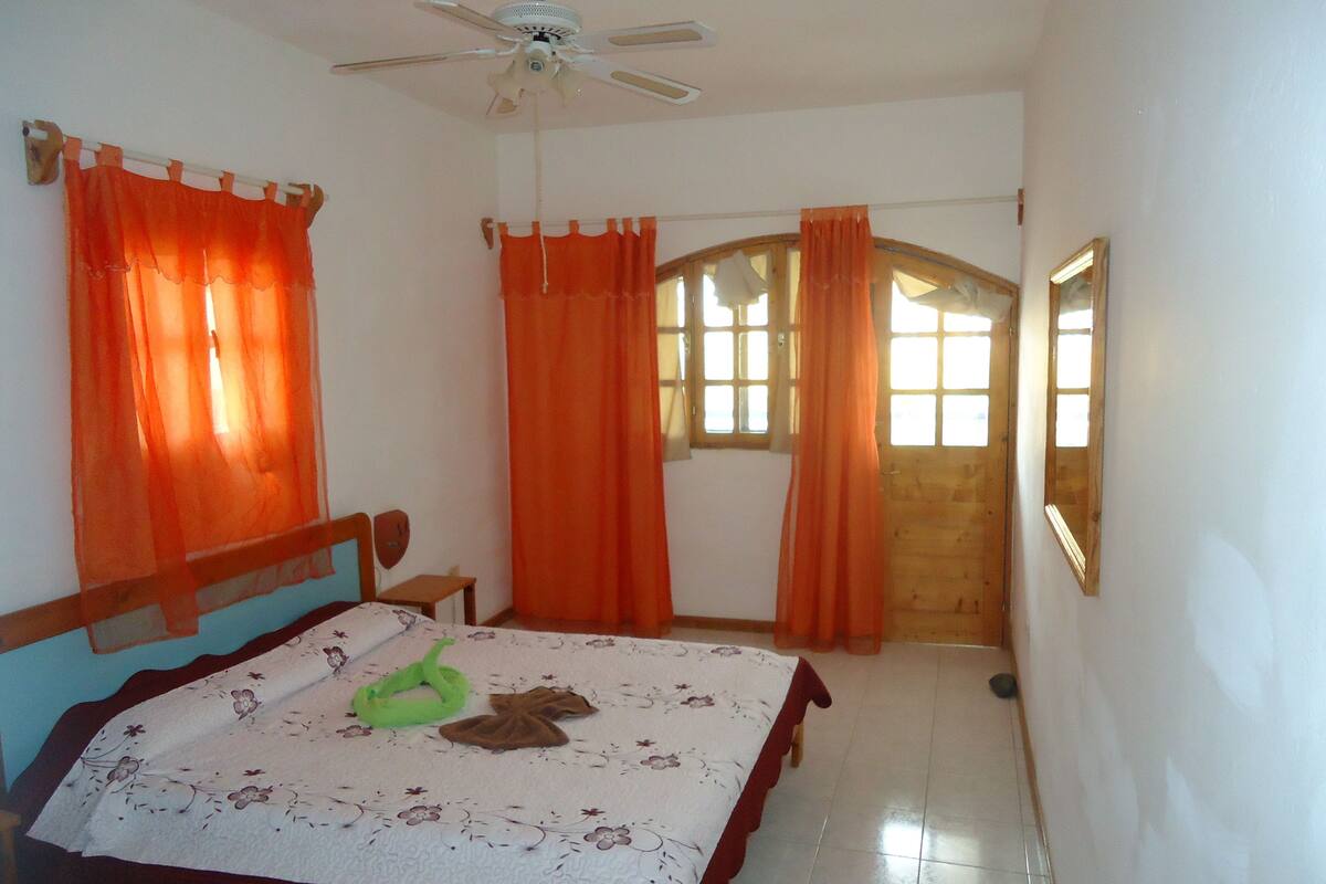 Blackout curtains, iron/ironing board, free cots/infant beds