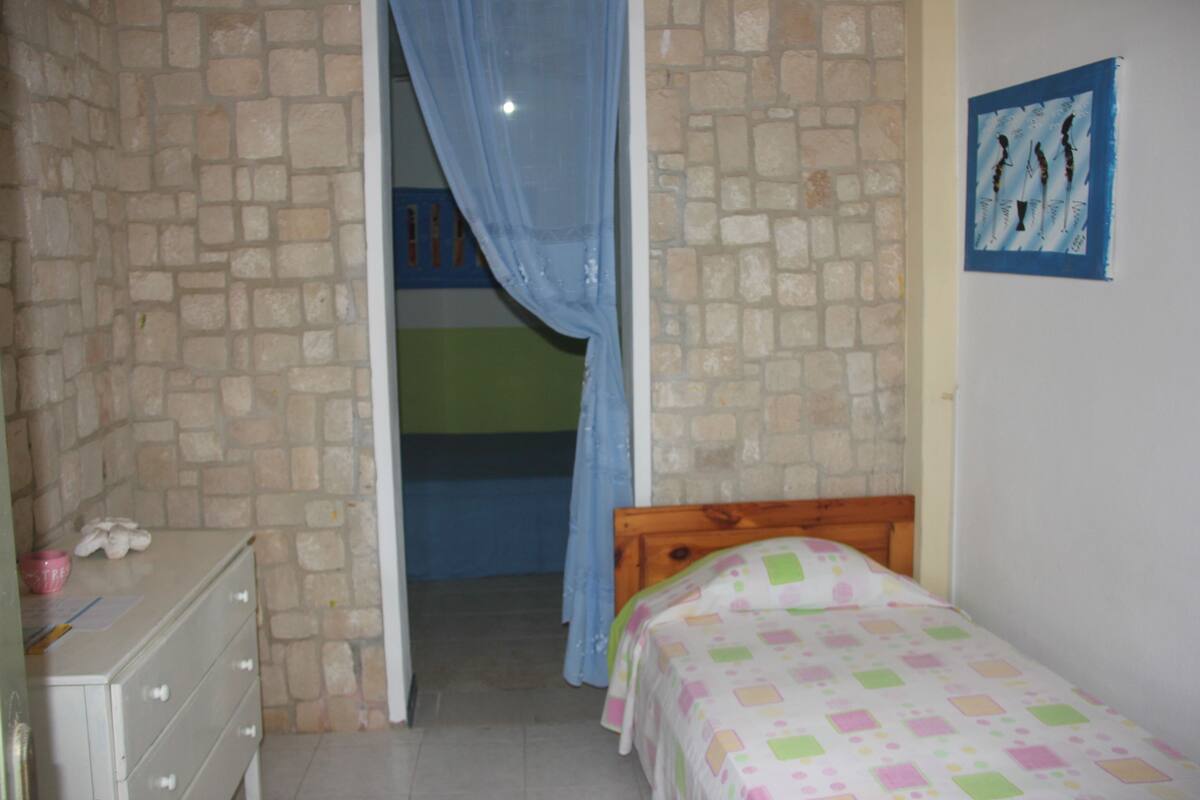 Blackout drapes, iron/ironing board, free cribs/infant beds