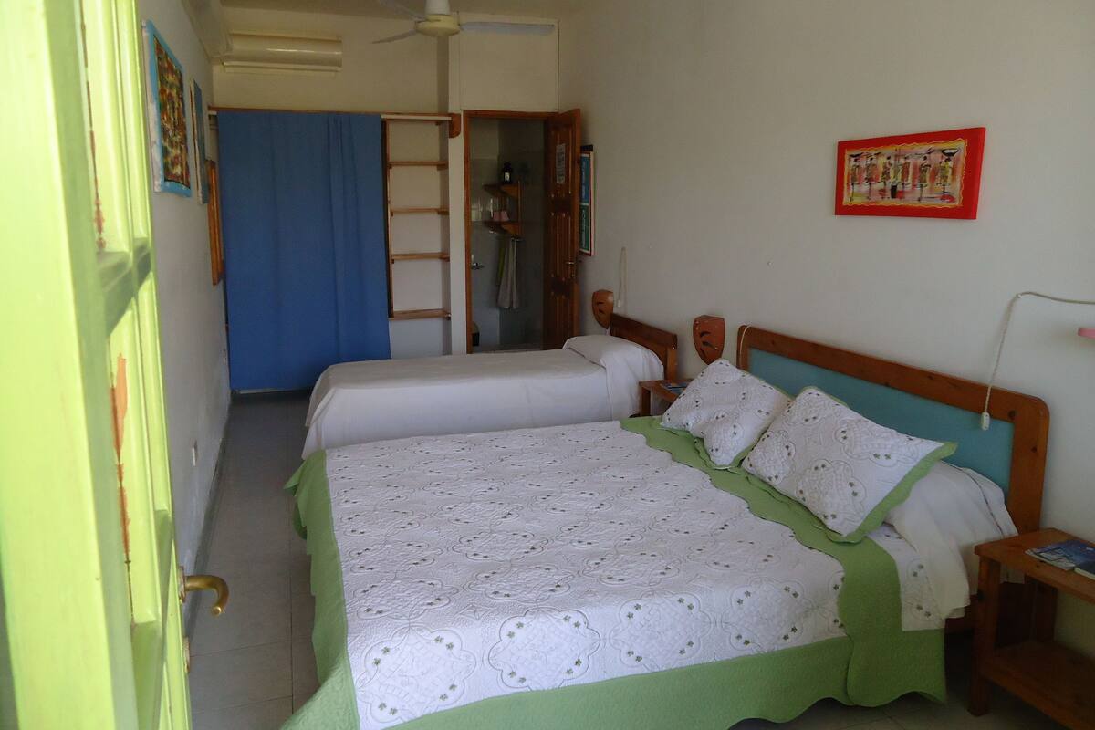 Blackout curtains, iron/ironing board, free cots/infant beds
