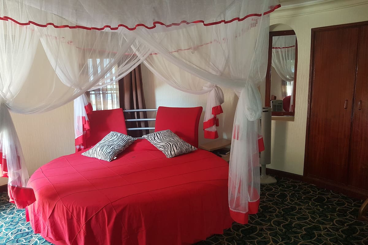 Premium bedding, down comforters, memory foam beds, in-room safe