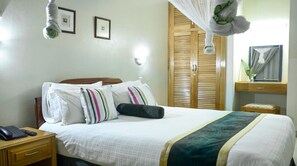 Premium bedding, down comforters, memory foam beds, in-room safe