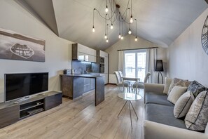 Deluxe Apartment, 2 Bedrooms, Balcony (without parking) A22B | Iron/ironing board, cots/infant beds, rollaway beds, free WiFi