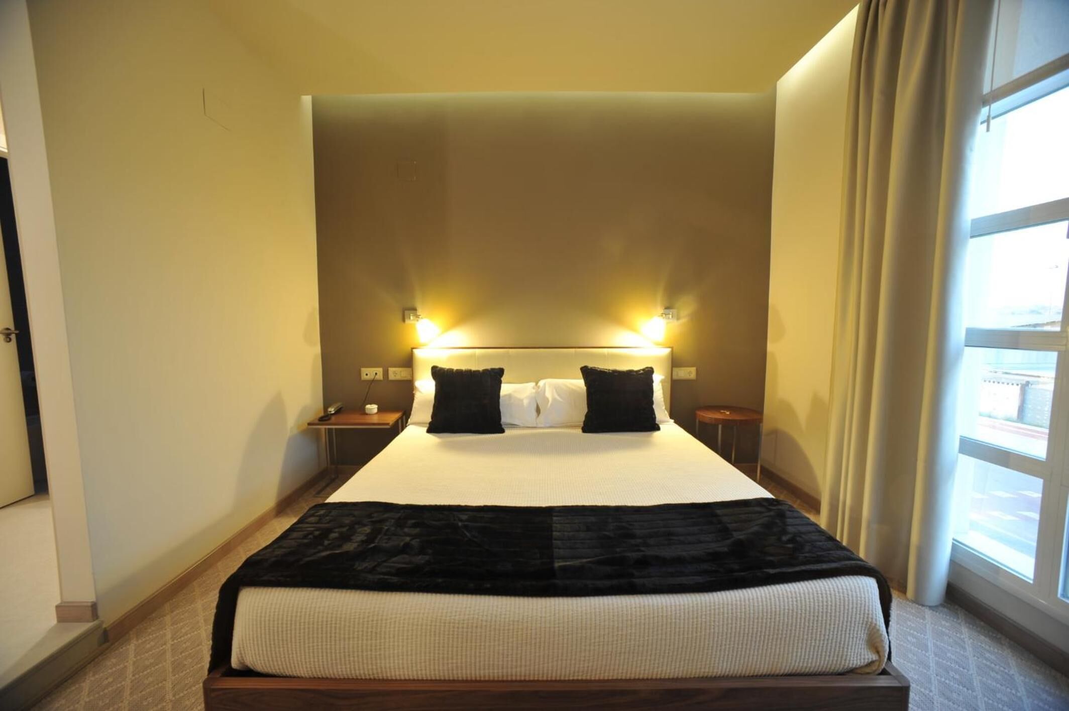 premium bedding, down duvets, pillow-top beds, in-room safe