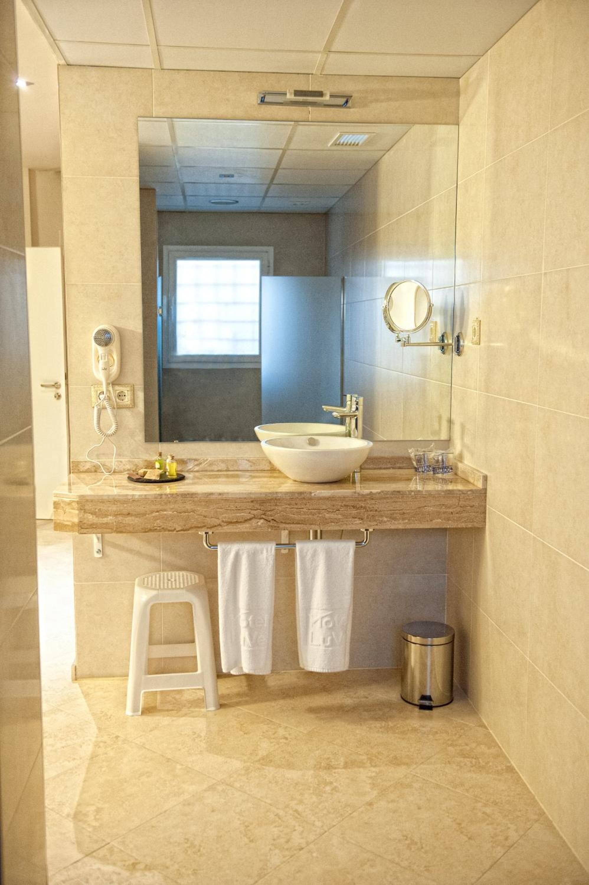 free toiletries, hair dryer, bidet, towels