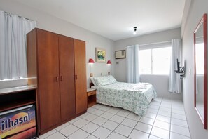 Quarto standard | Frigobar, cofres nos quartos, Wi-Fi de cortesia, roupa de cama