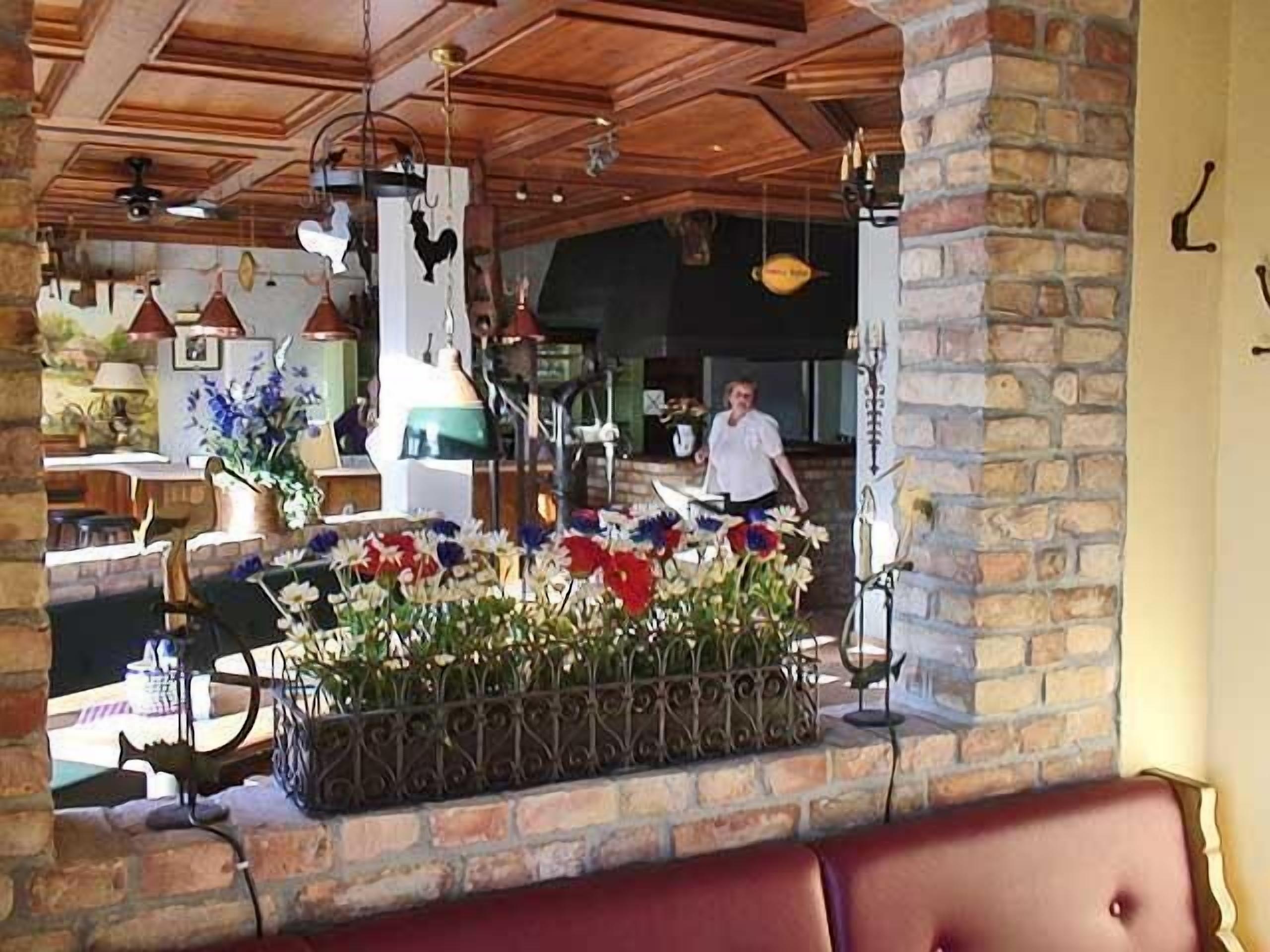 breakfast, lunch, dinner served; regional cuisine, al fresco dining