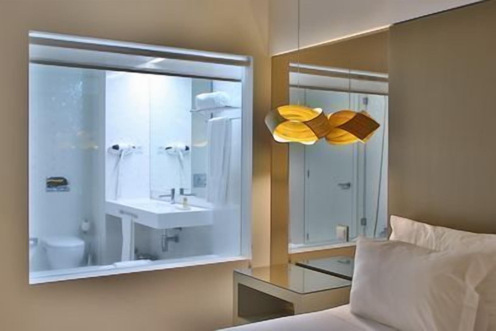 double or twin room, 1 double or 2 single beds, river view | minibar, in-room safe, desk, blackout curtains