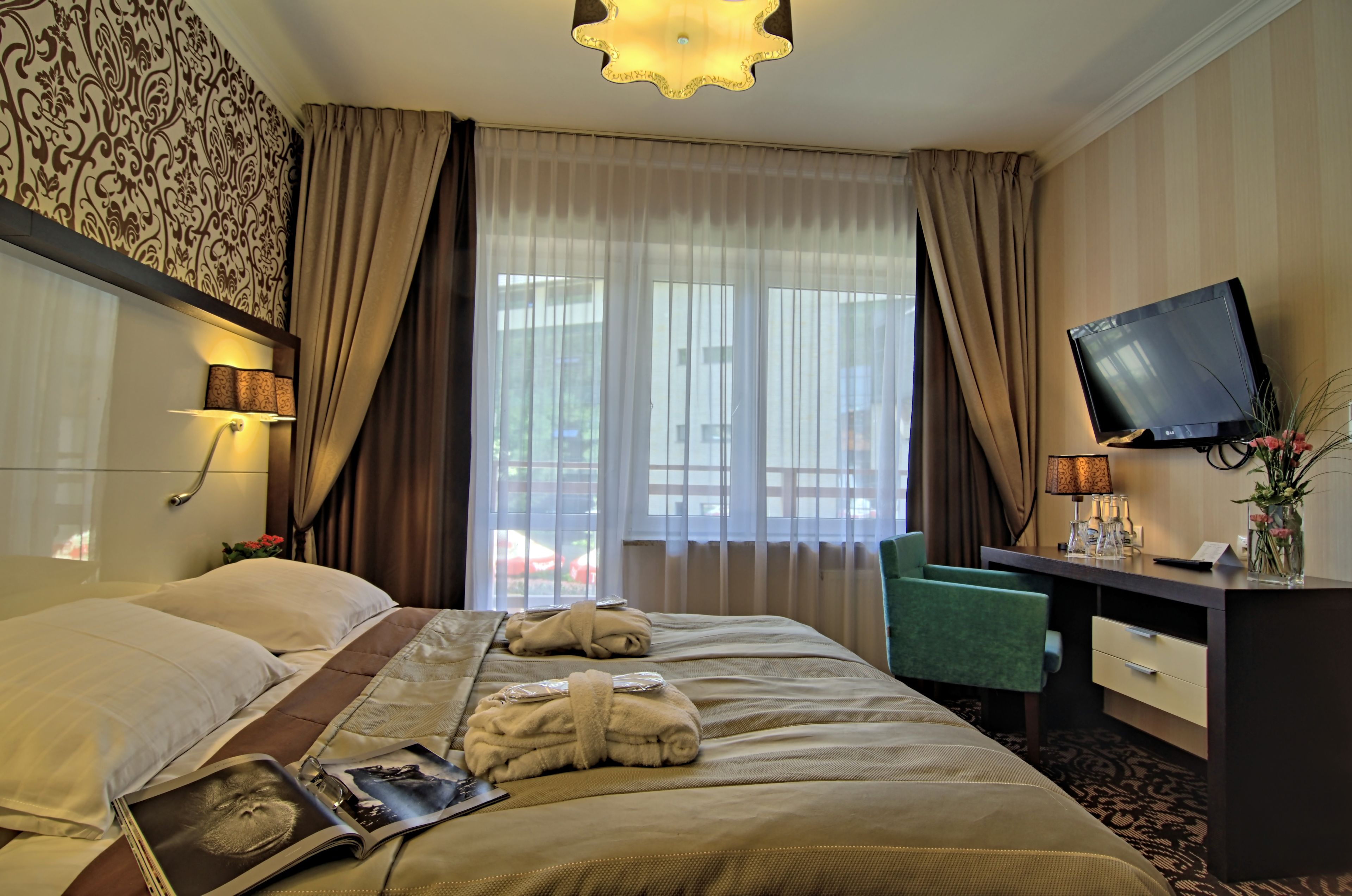 in-room safe, desk, blackout curtains, iron/ironing board