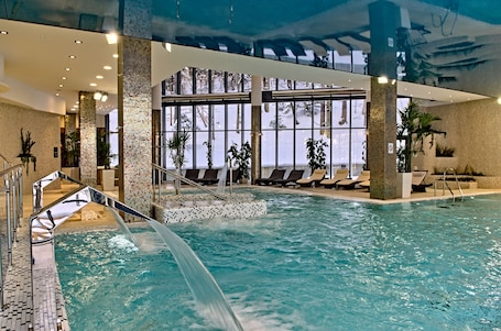 Indoor pool, open 7 AM to 11 PM, sun loungers