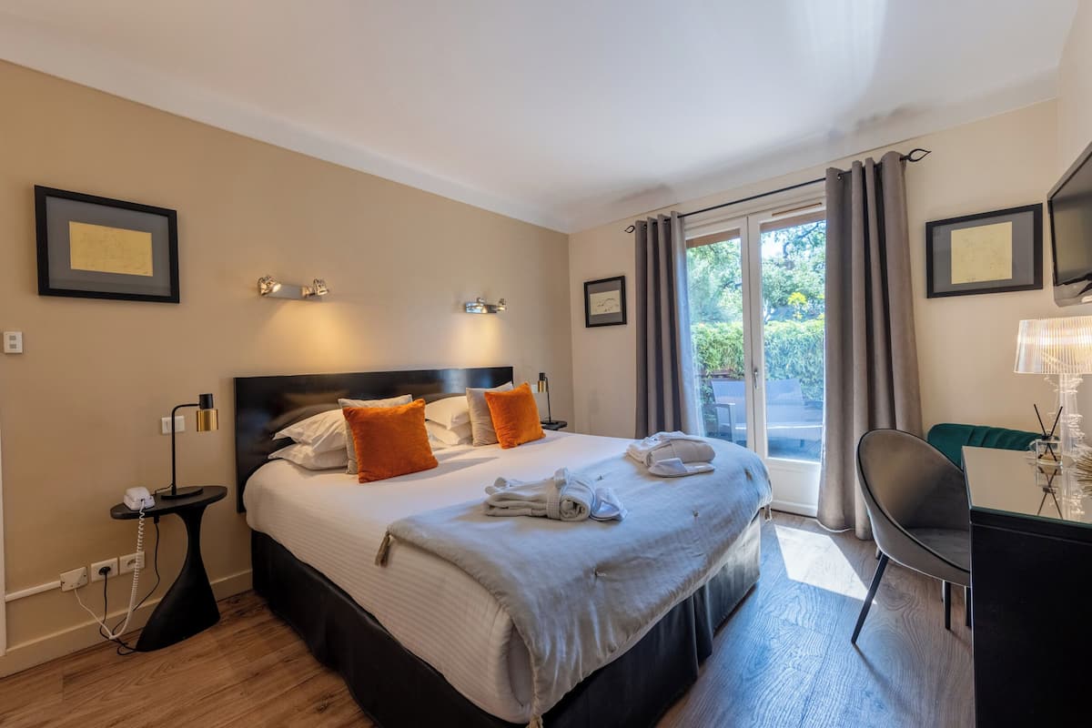 Familie vierpersoonskamer | Luxe beddengoed, een minibar, een kluis op de kamer