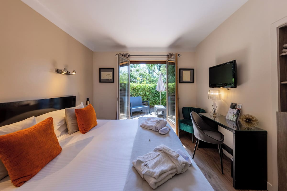 Familie vierpersoonskamer | Luxe beddengoed, een minibar, een kluis op de kamer