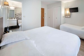 Family Room, Multiple Beds, Non Smoking | Laptop workspace, blackout drapes, iron/ironing board - Sure Hotel by Best Western Saintes (Saintes)