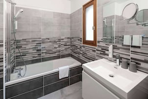 Hair dryer, towels, soap, shampoo