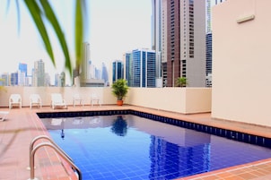 Outdoor pool, open 7:00 AM to 10:00 PM, sun loungers