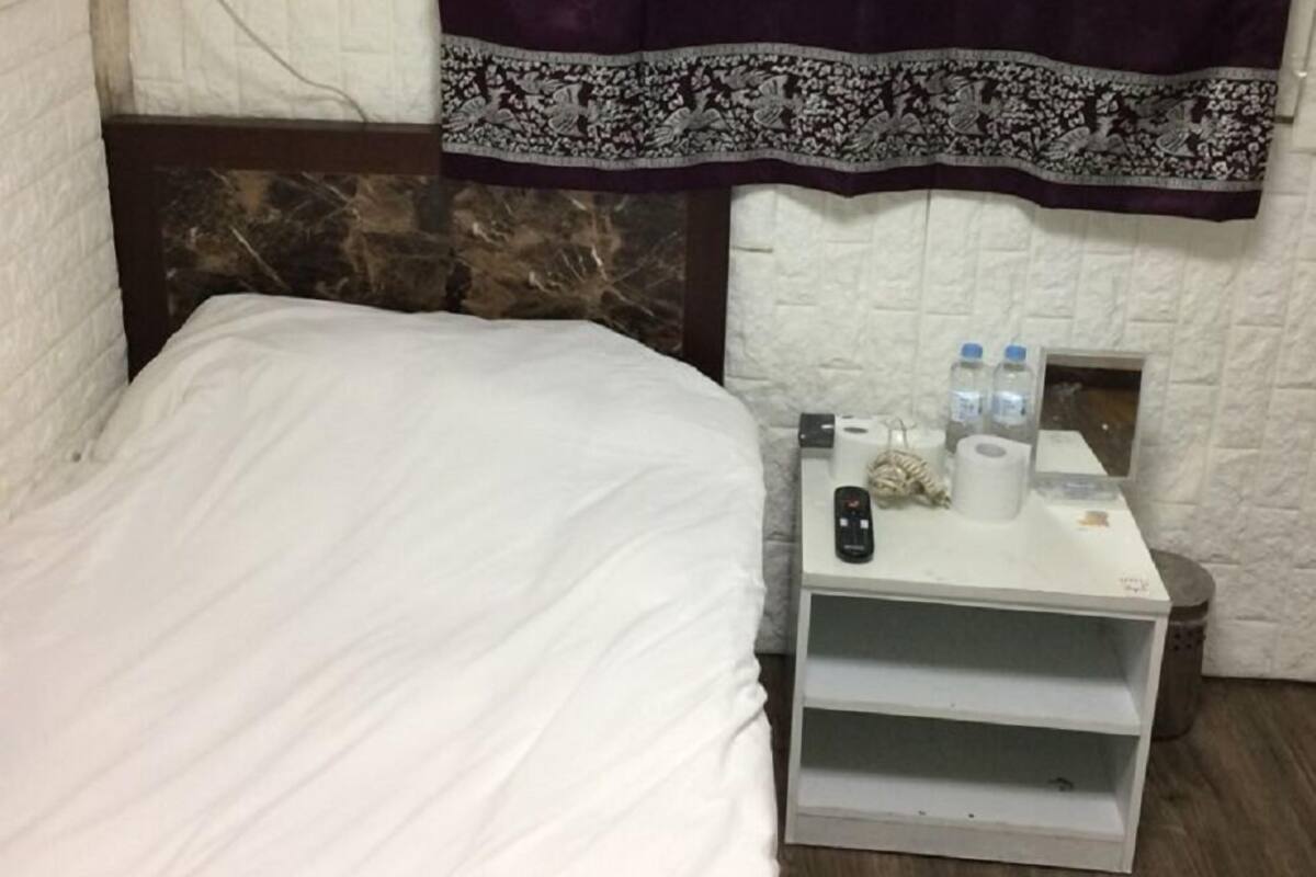 Economy Single Room, 1 Twin Bed, Non Smoking (basement) | Down comforters, blackout drapes, WiFi (free)