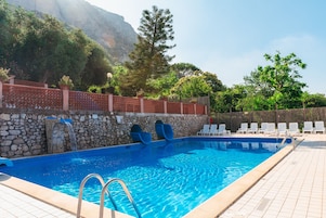 Seasonal outdoor pool, pool umbrellas, sun loungers