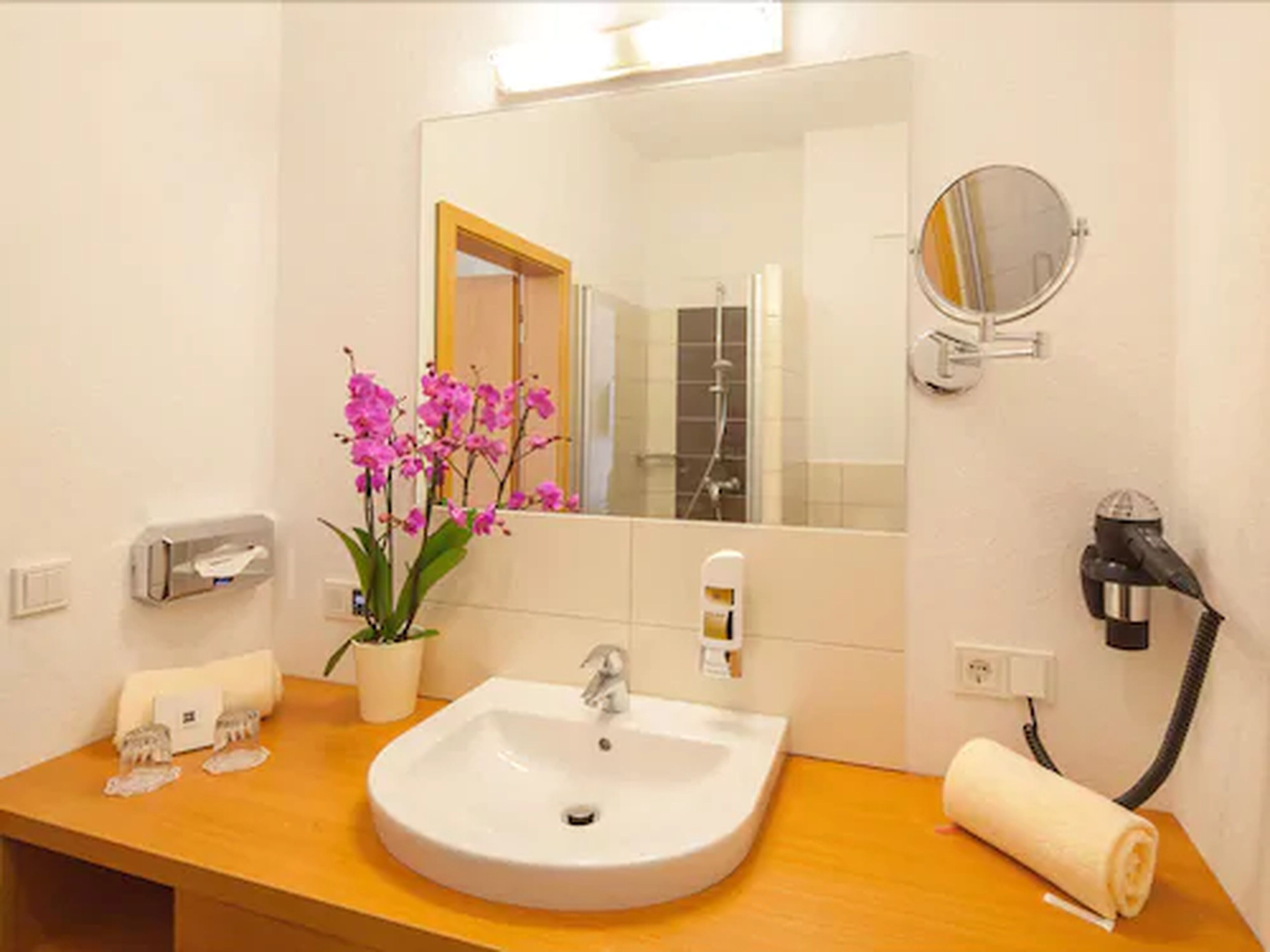 free toiletries, hair dryer, bathrobes, slippers