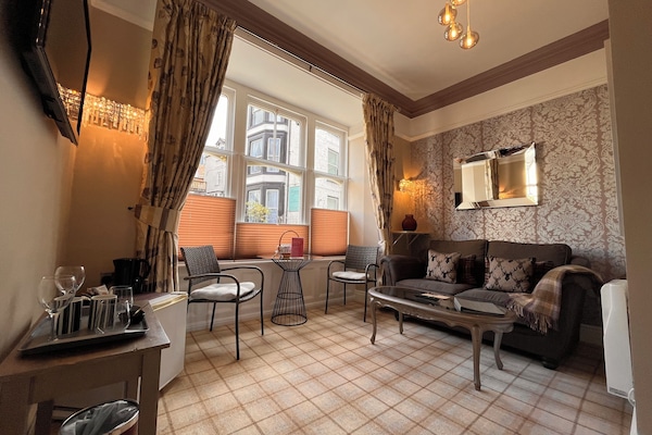 Suite, Balcony (Rydal) | Living area | TV, fireplace