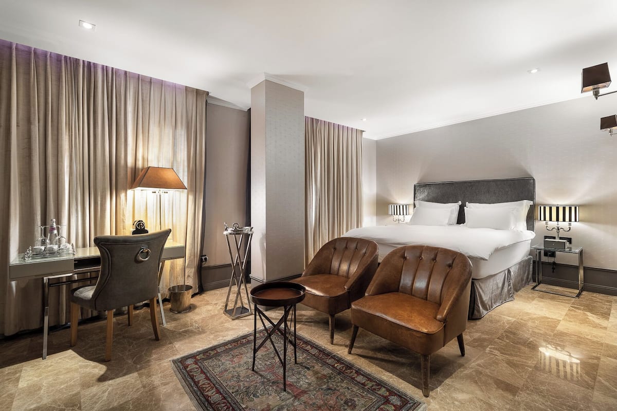 Suite Deluxe | 1 habitación, sábanas de algodón egipcio y ropa de cama de alta calidad