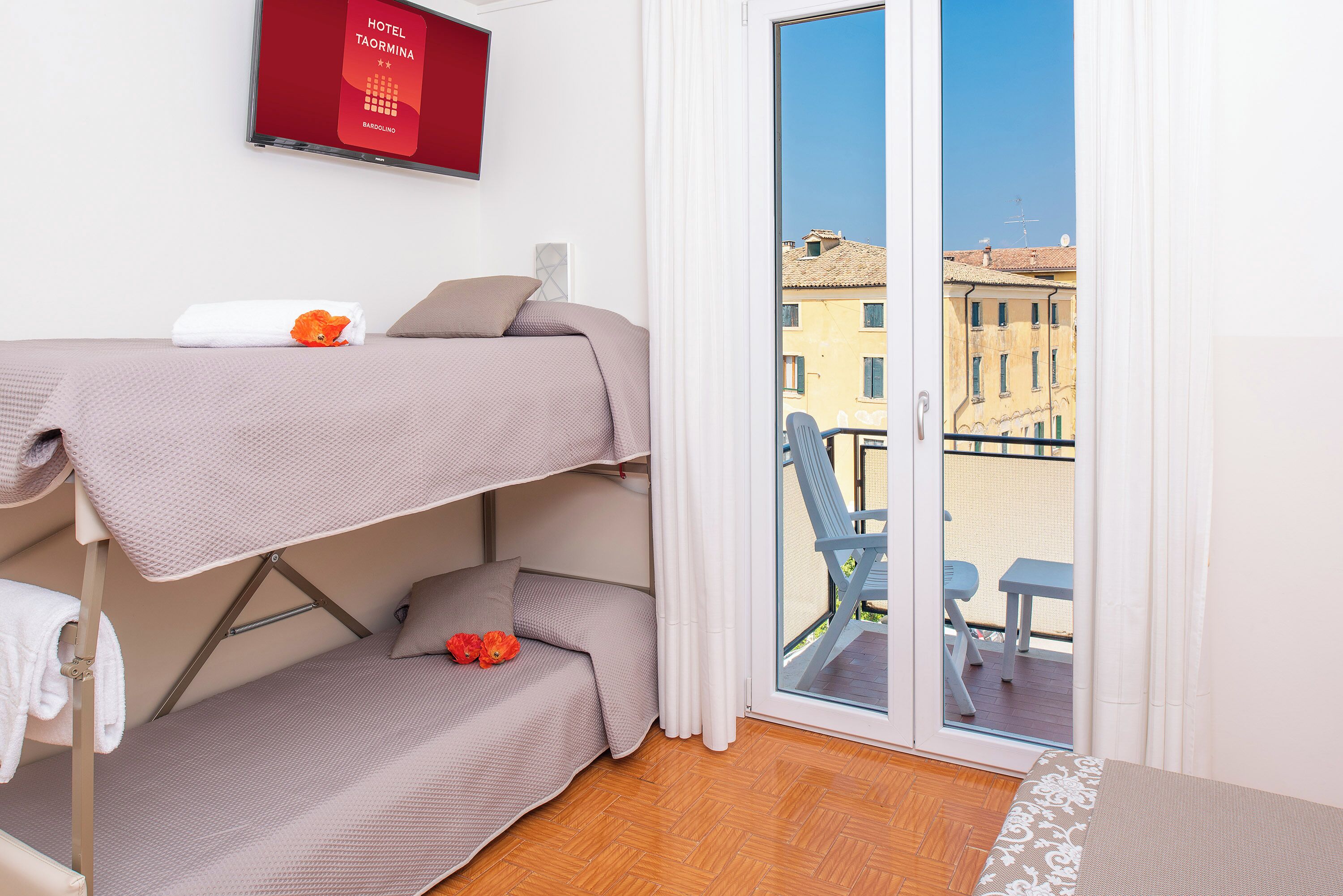 family room | 1 bedroom, in-room safe, desk, laptop workspace