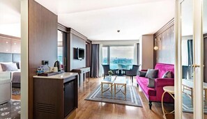 Royal Suite | Living area | 43-inch Smart TV with satellite channels, DVD player, iPod dock