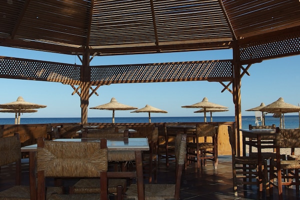 Breakfast, lunch served; international cuisine, al fresco dining