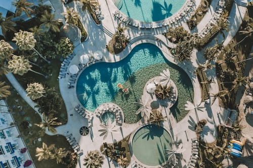2 outdoor pools, pool umbrellas, pool loungers