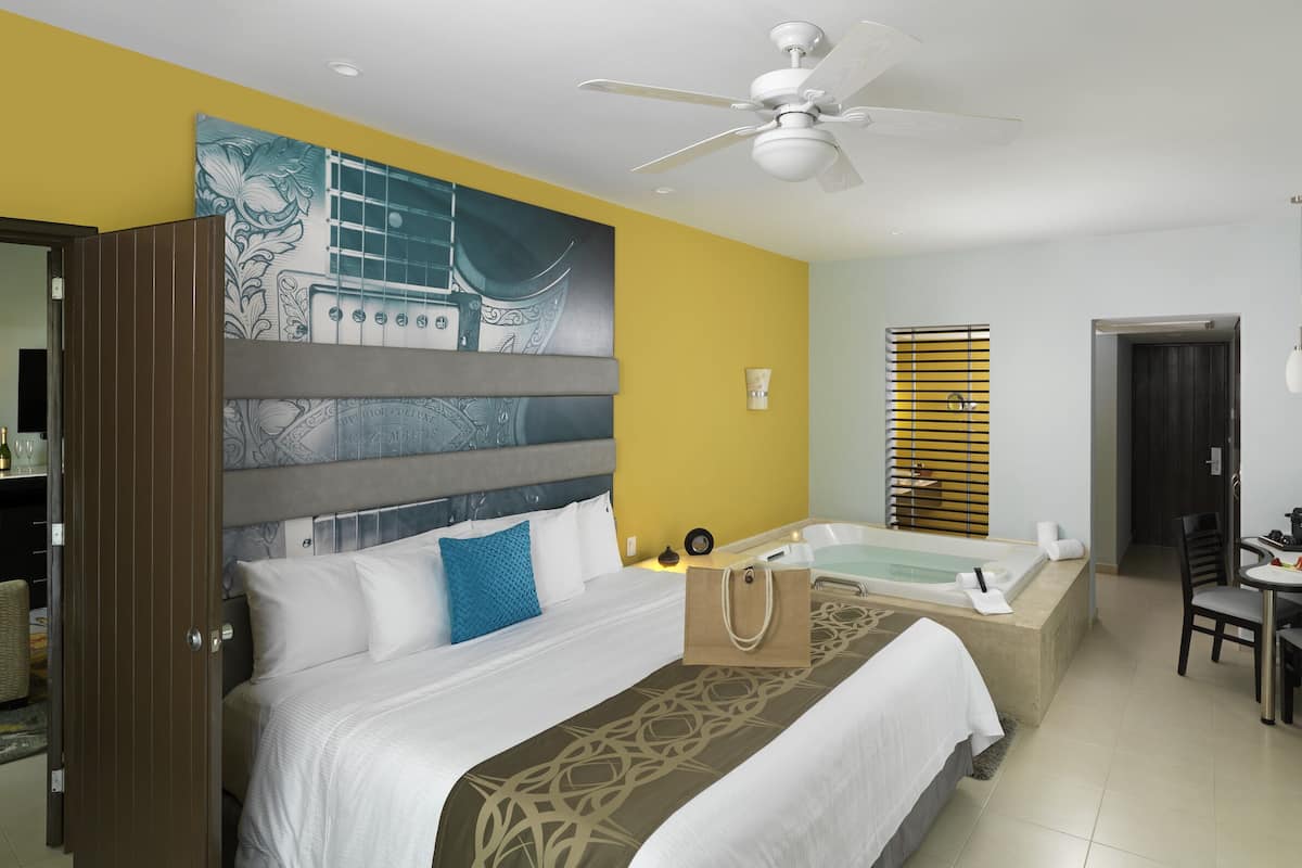 Egyptian cotton sheets, premium bedding, down comforters, free minibar