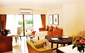 Executive-sviitti, 1 suuri parisänky | Olohuone | LCD-televisio, DVD-soitin, maksullisia elokuvia