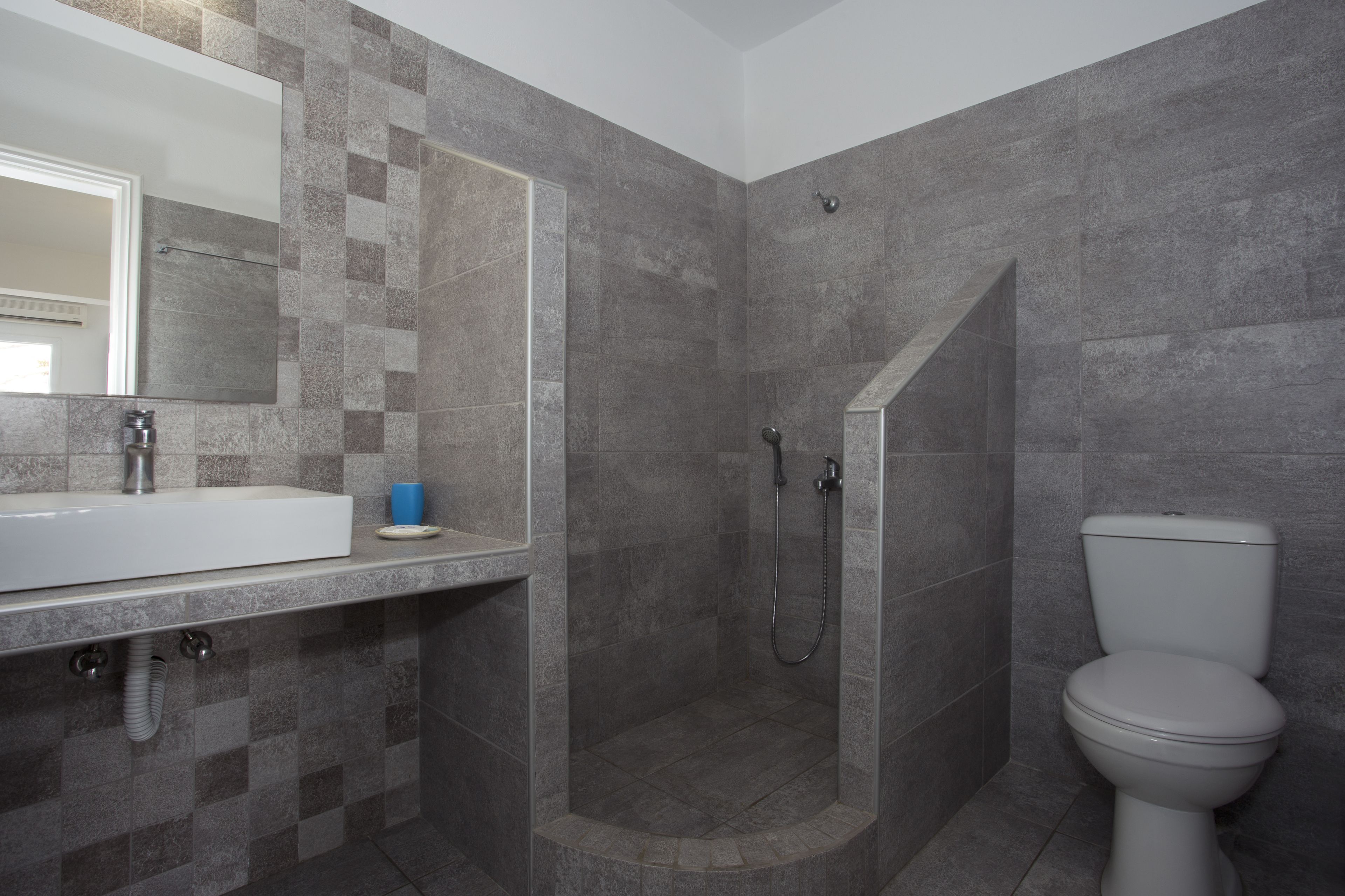 shower, rainfall showerhead, hair dryer, towels