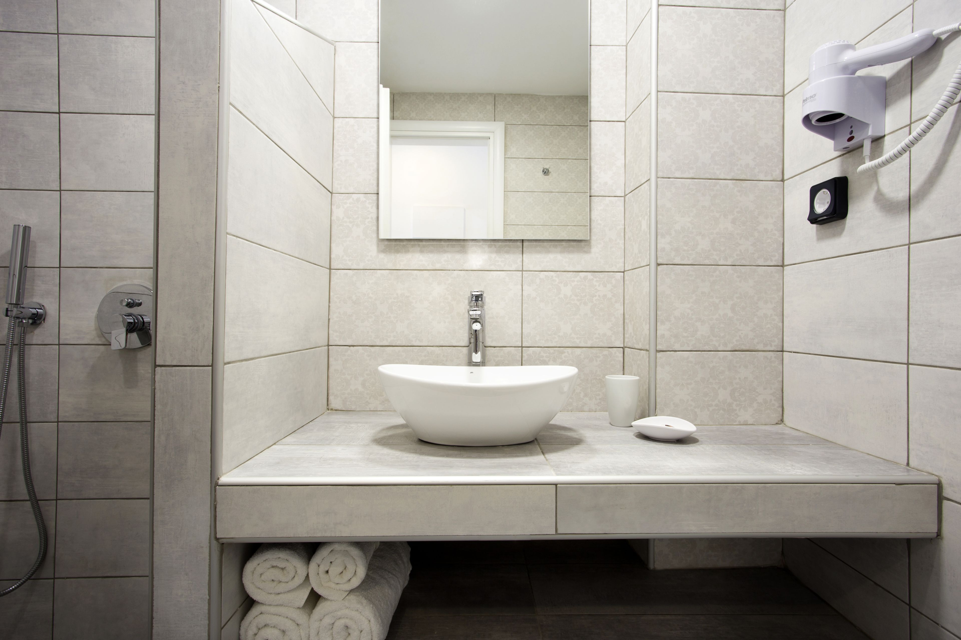 shower, rainfall showerhead, hair dryer, towels