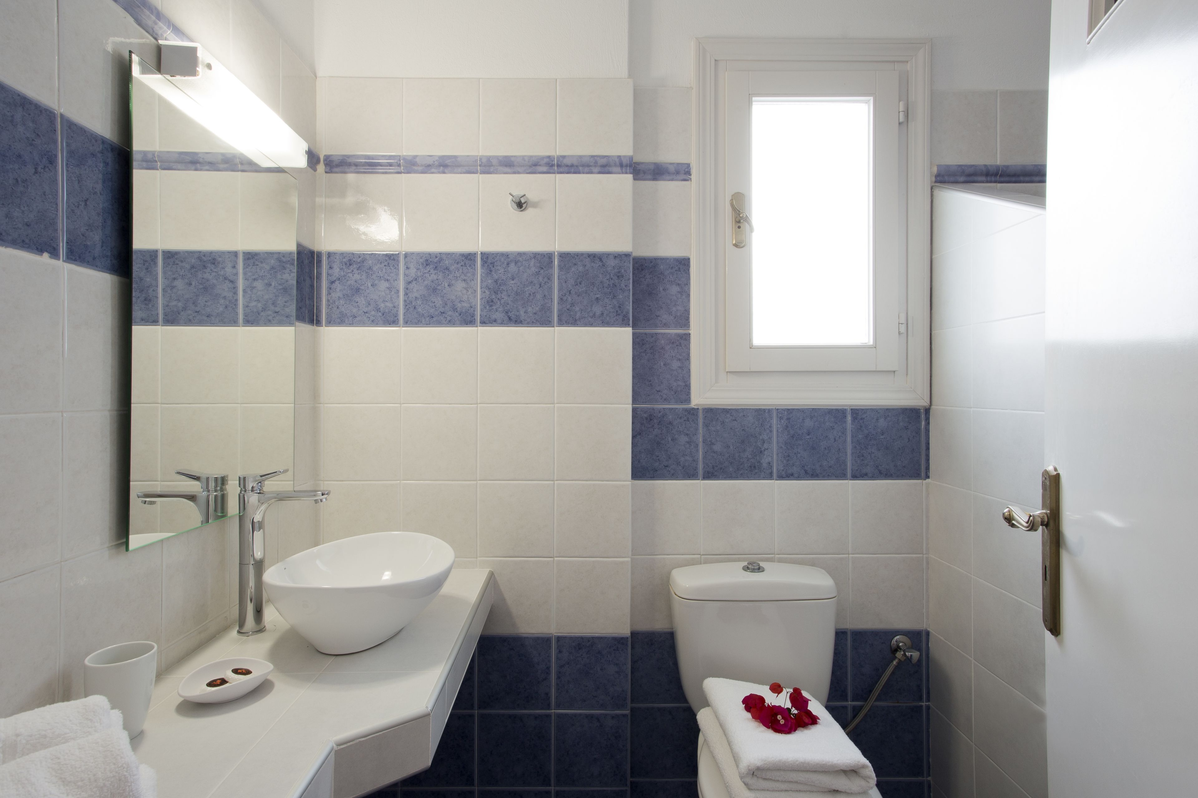 apartment | bathroom | shower, rainfall showerhead, hair dryer, towels