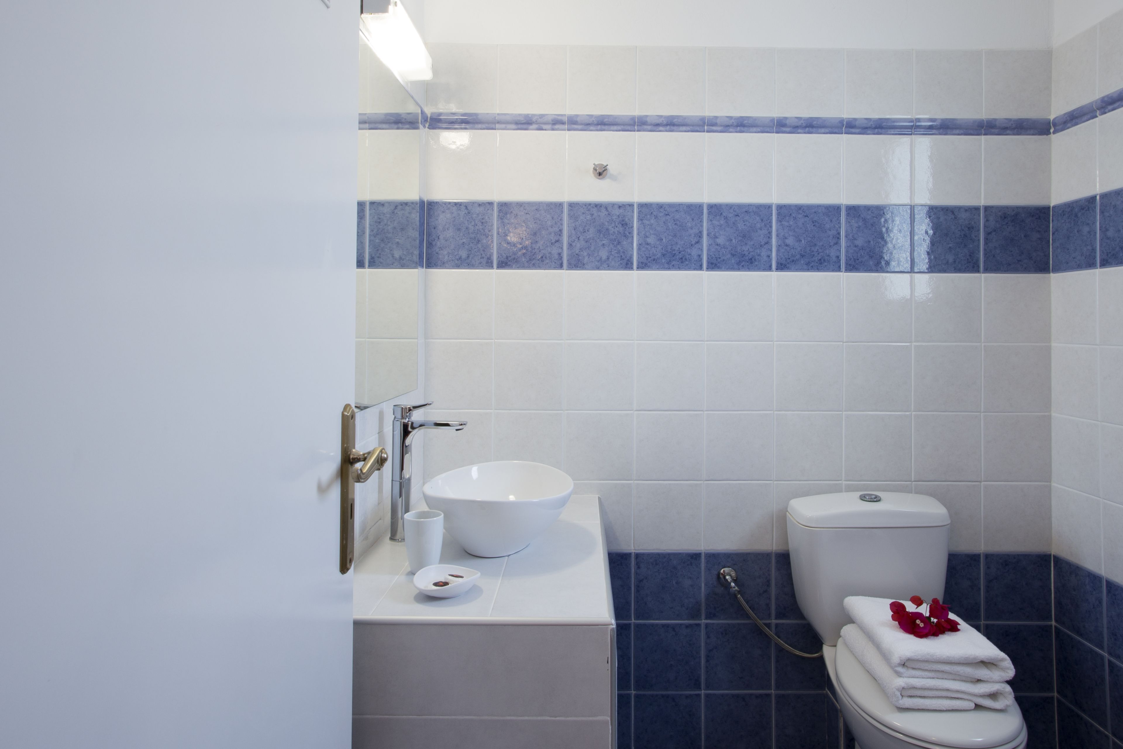 studio | bathroom | shower, rainfall showerhead, hair dryer, towels