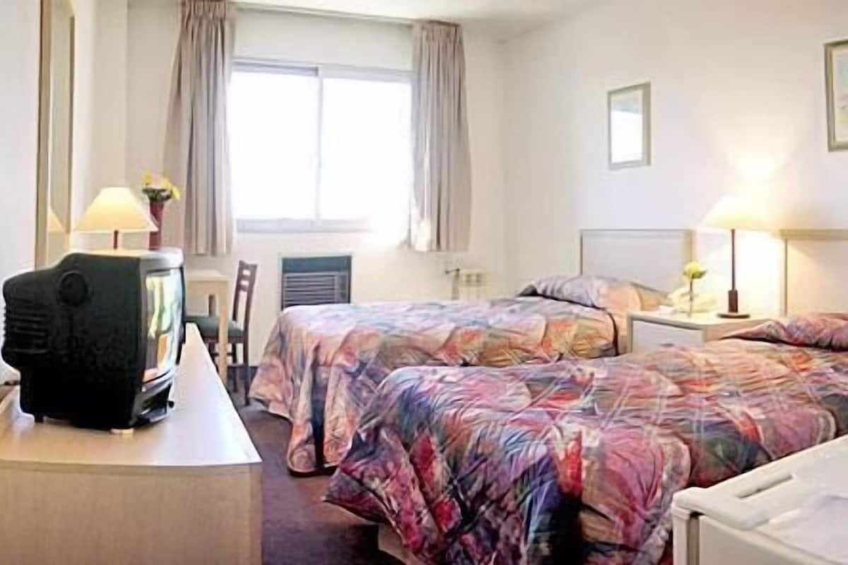 Ropa de cama de alta calidad, colchones con pillow-top y minibar