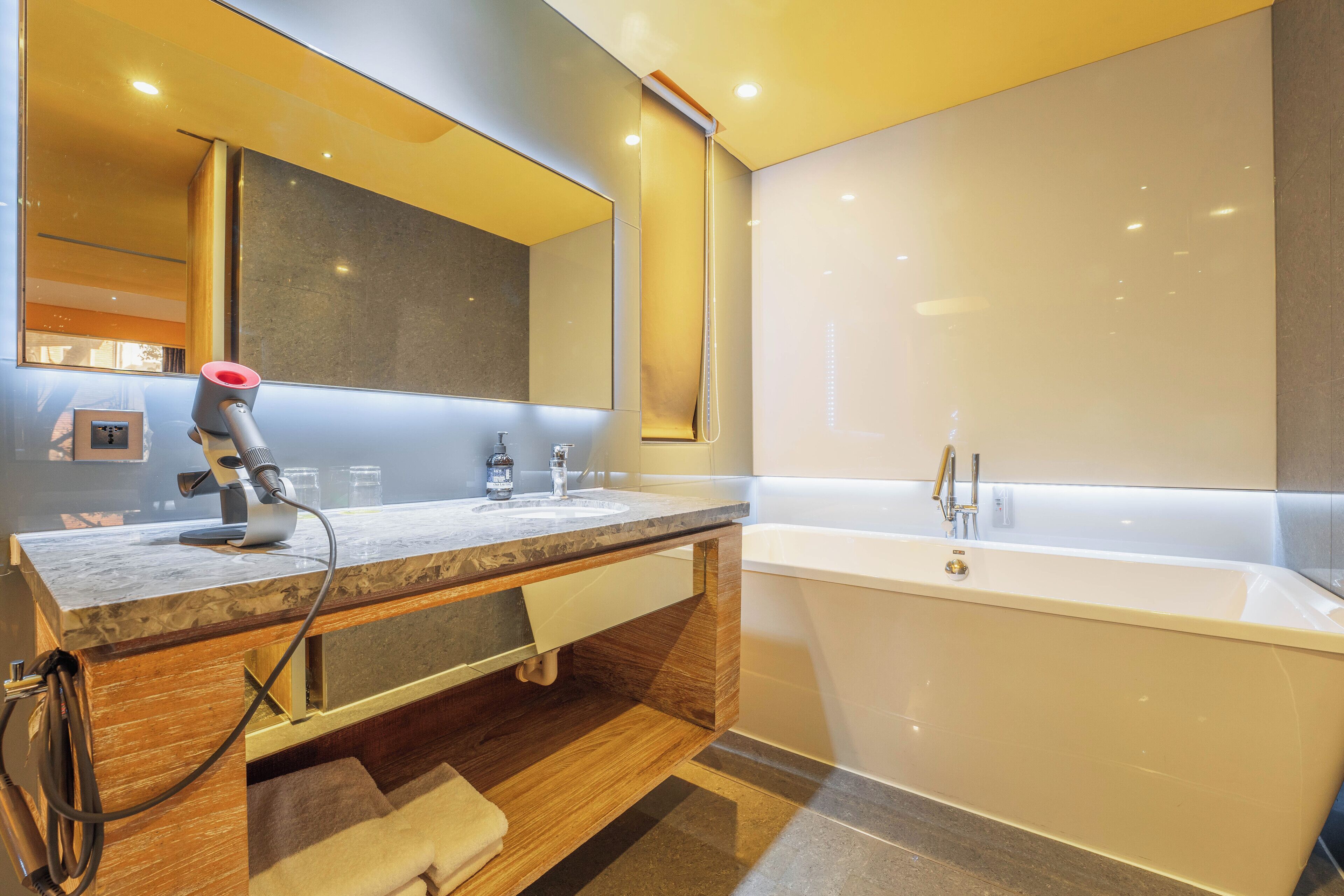 villa room | bathroom | designer toiletries, hair dryer, slippers, electronic bidet
