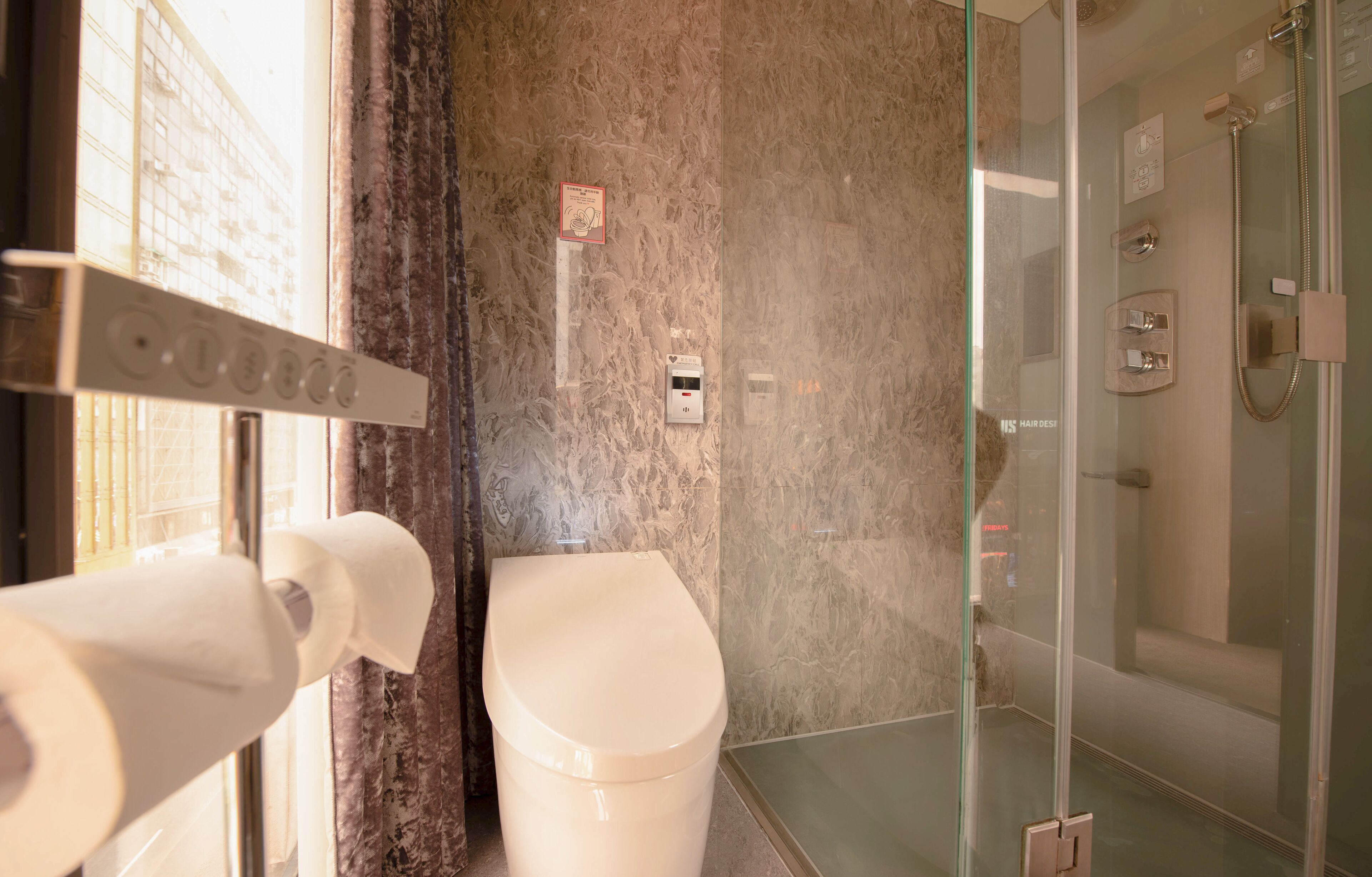 vip | bathroom | designer toiletries, hair dryer, slippers, electronic bidet