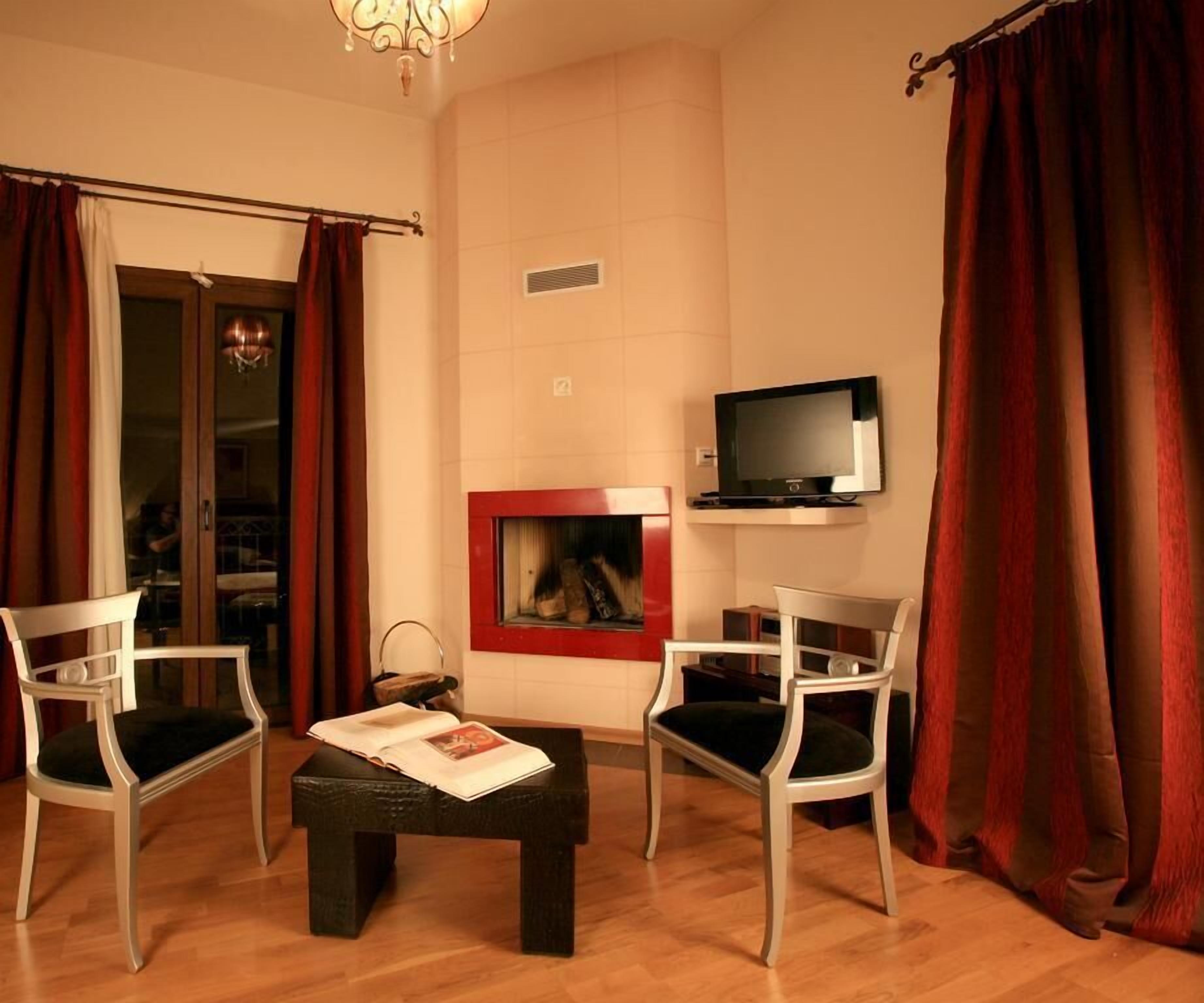 Deluxe Suite (Meteora View) | Living area | 22-inch TV with digital channels, DVD player