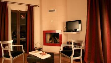 Deluxe Suite (Meteora View) | Living area | 22-inch TV with digital channels, DVD player